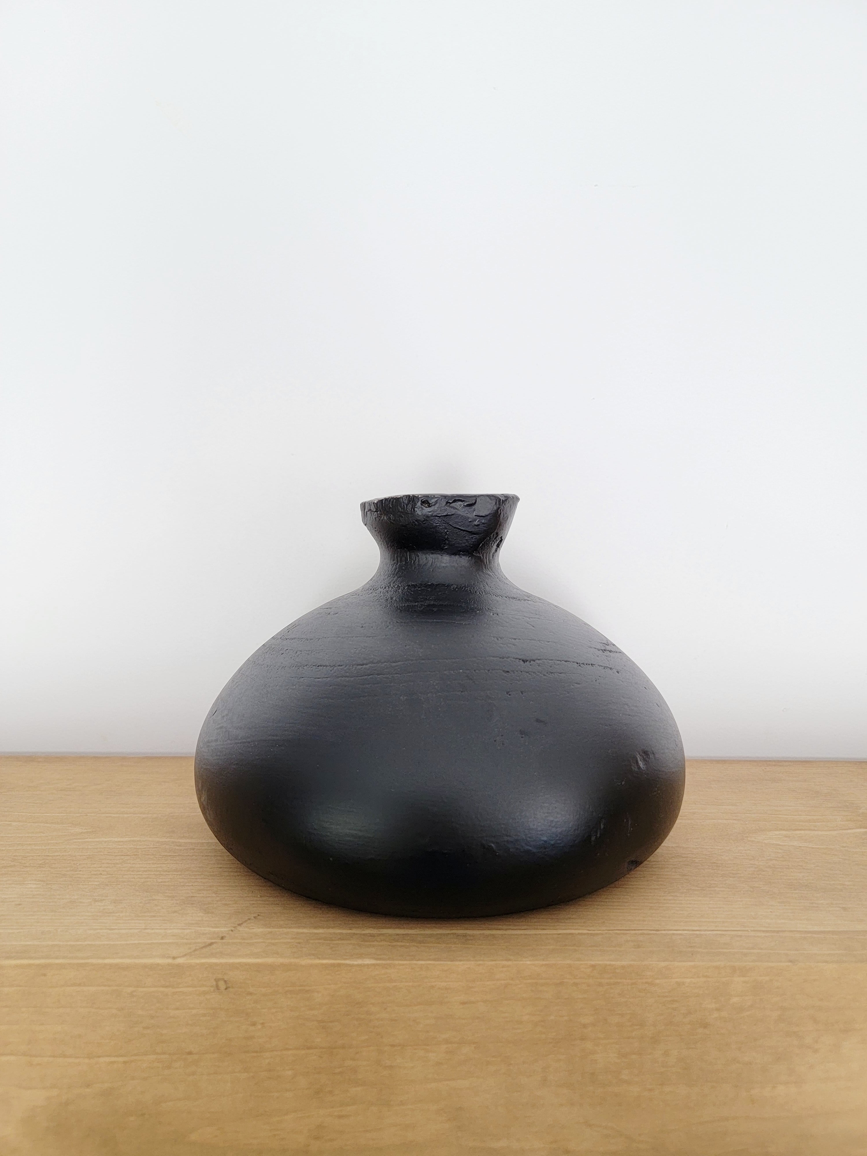 Black wood vase